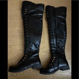 Thigh high black boots